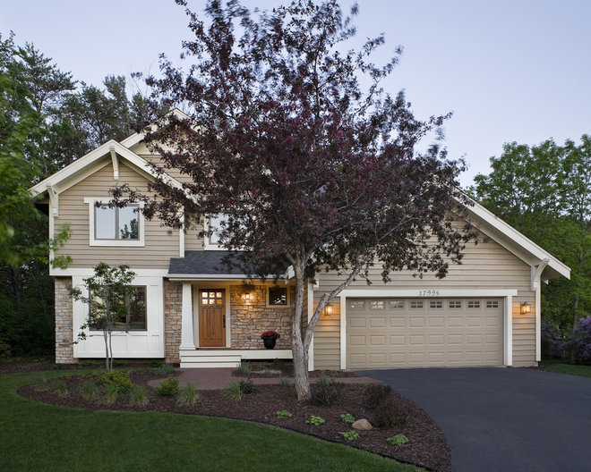 Traditional Exterior by TreHus Architects+Interior Designers+Builders