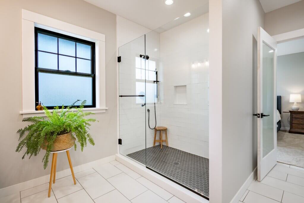 White bathroom with a walk-in shower