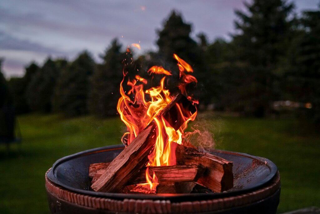 Fire pit in a grassy yard